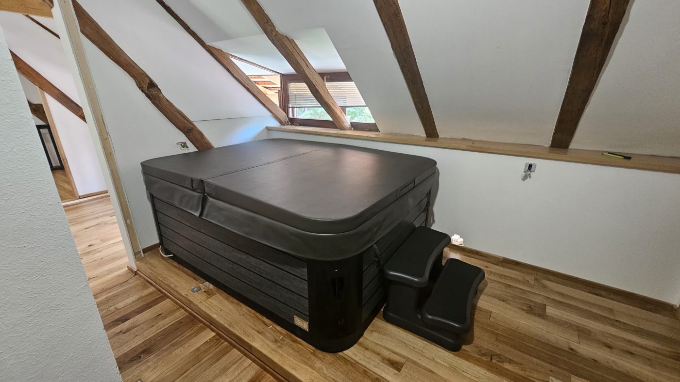 Indoor jacuzzi in the attic.